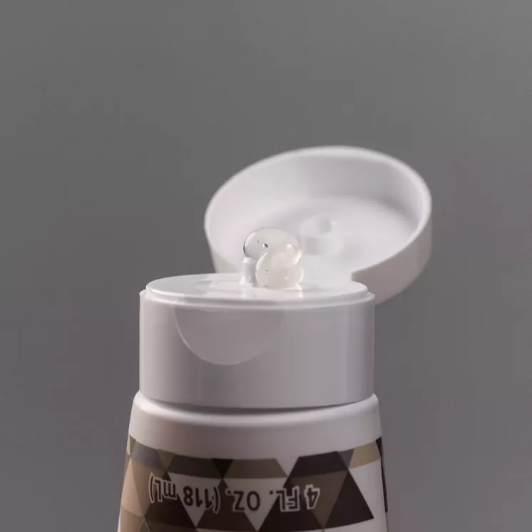 Bouchon ouvert du tube d’Aloe MSM Gel avec une dose de gel visible